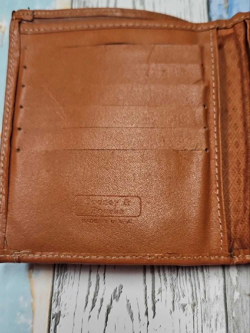Vintage Dooney & Bourke All-Weather Leather compact wallet in hunter green/tan